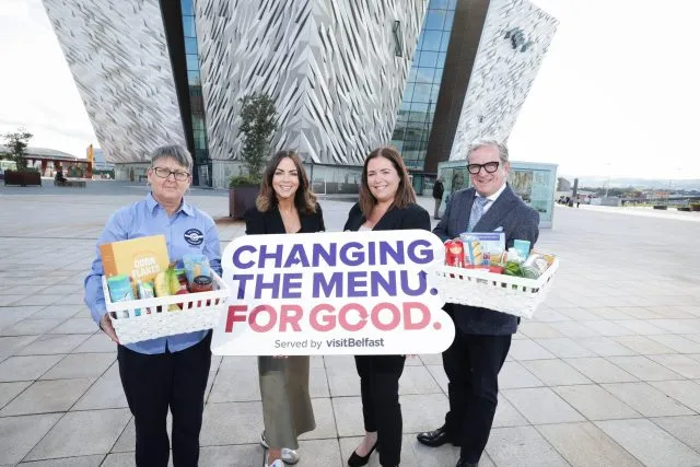 Group of 4 people standing outside Titanic Belfast holidaying the Changing The Menu for Good